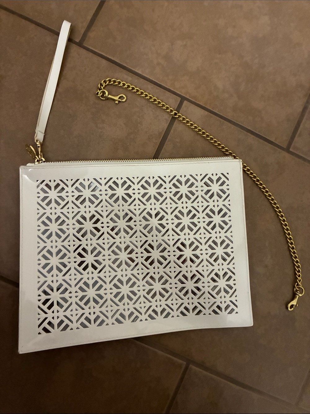 Tory Burch White Laser-Cut Wristlet Clutch with Gold Chain Strap, never used